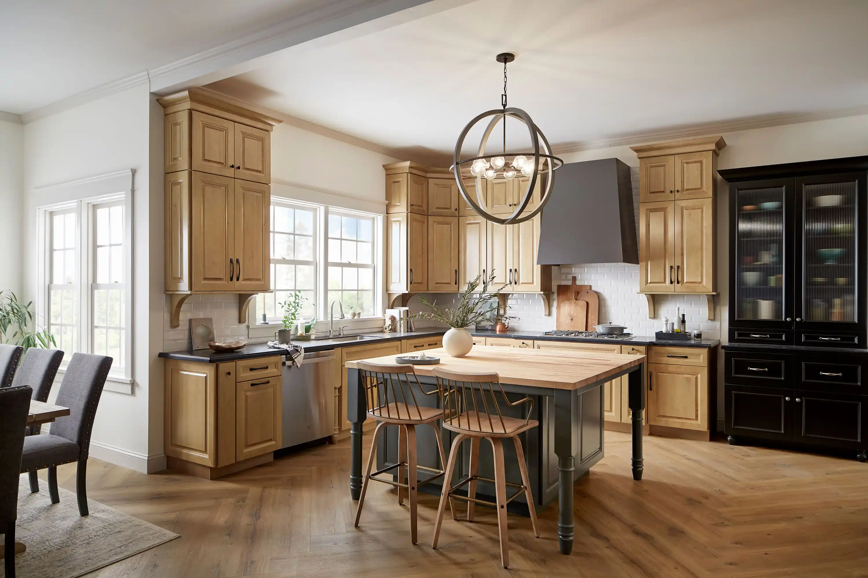 Herringbone style flooring in kitchen with island
