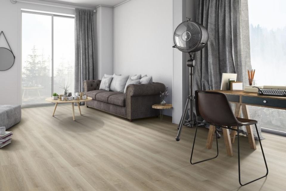 Water resistant vinyl flooring in living room with work desk 